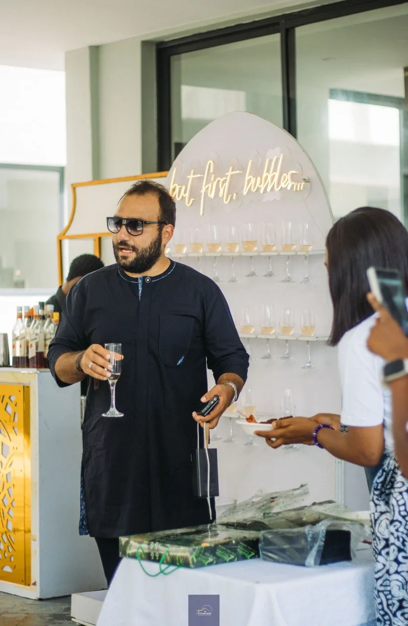 A guest at the champagne reception